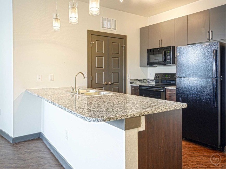 Kitchen at SEVEN TWELVE LOFTS Apartments, Denton, TX, 76201